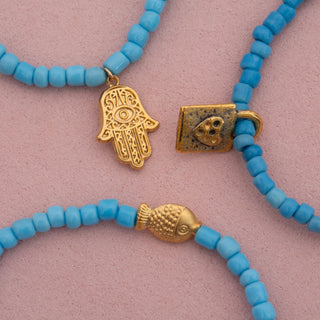 Dara Blue Glass Bead Bracelet with Gold Pendant