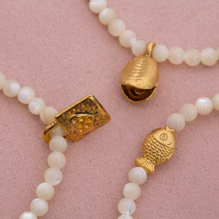 Dara Moon White Glass Bead Bracelet with Gold Pendant